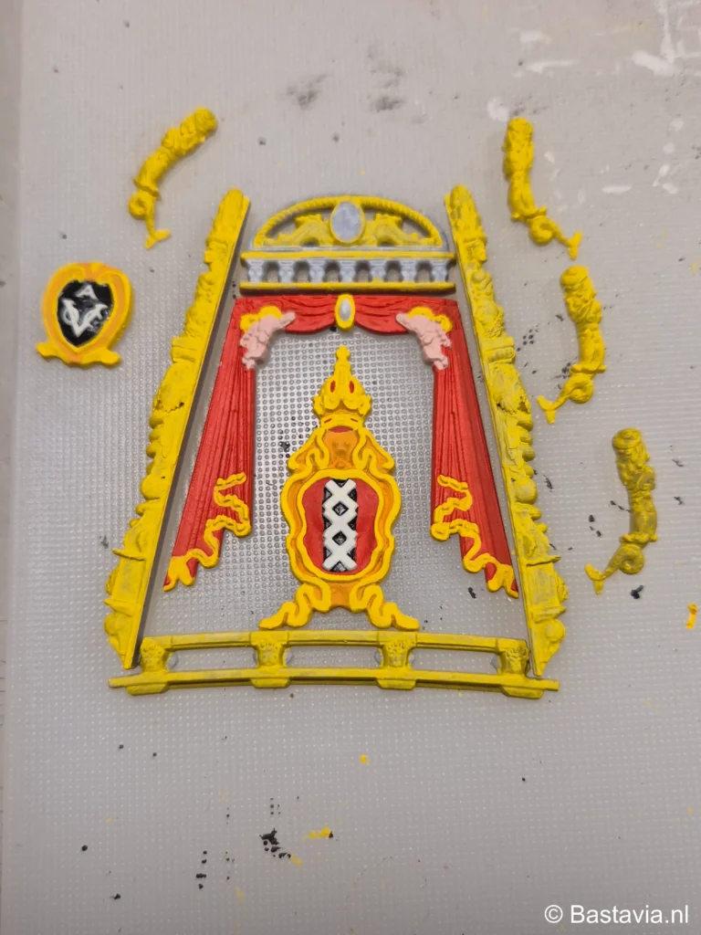 Spiegelornamenten met bijschrift